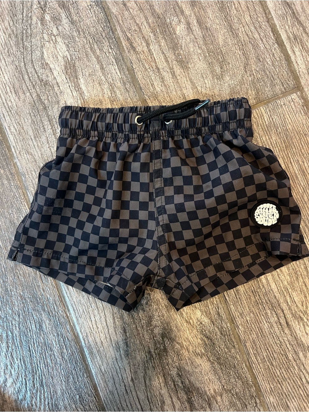 Little Surfer Dude swim trunks.